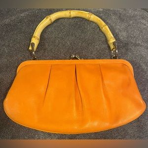 Fossil 1954 satchel with Kiss-lock opening and bamboo handle